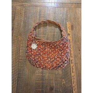 Jessica Simpson hobo bag With A colorful woven Exterior Breaded Shoulder Strap